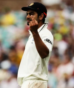 Virat Kohli shows a middle finger to the Australian crowd.