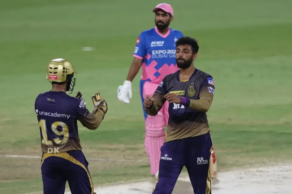 Varun Chakravarthy celebrates a wicket.