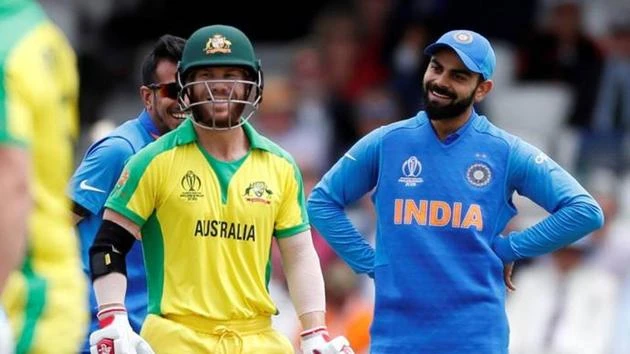 Virat Kohli and David Warner having a chat.