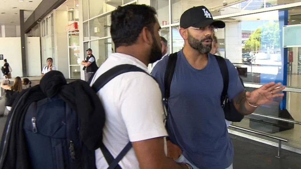 Australian media being questioned by Virat Kohli for filming his family without consent.
