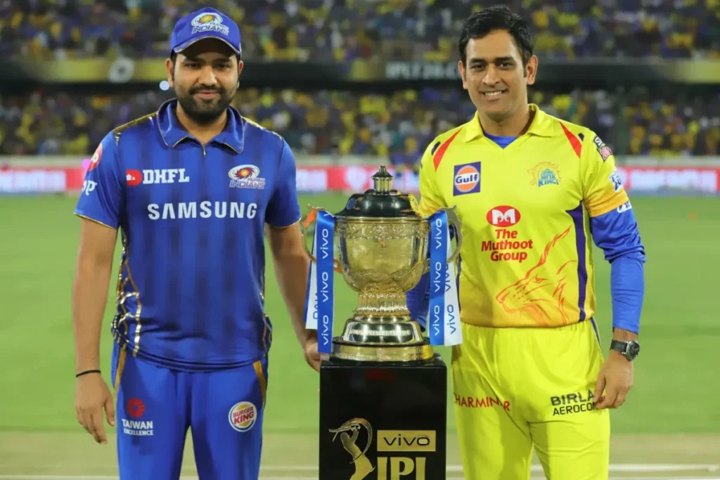 Rohit Sharma and MS Dhoni with the IPL trophy.
