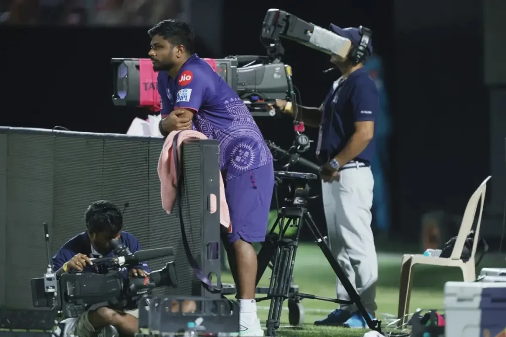 Sanju Samson is standing beyond the boundary line.