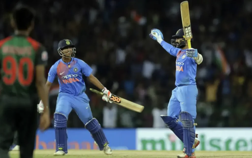 Dinesh Karthik celebrates after hitting the winning runs for India.