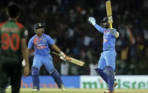 Dinesh Karthik celebrates after hitting the winning runs for India.