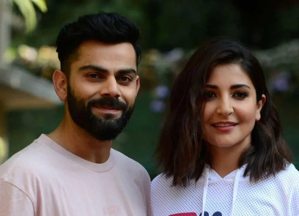 Virat Kohli and Anushka Sharma seek blessings from Premanand Maharaj post IPL victory.